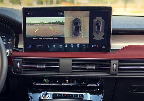 The driver of a 2024 Lincoln Corsair® SUV is shown selecting the drive mode. | Duncan Lincoln in Blacksburg VA