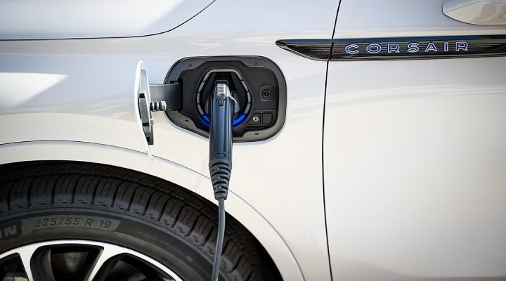 An electric charger is shown plugged into the charging port of a Lincoln Corsair® Grand Touring
model. | Duncan Lincoln in Blacksburg VA